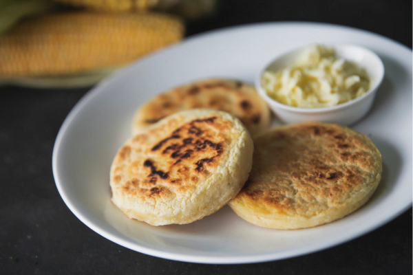 Sweet arepitas with grated Llanero cheese
